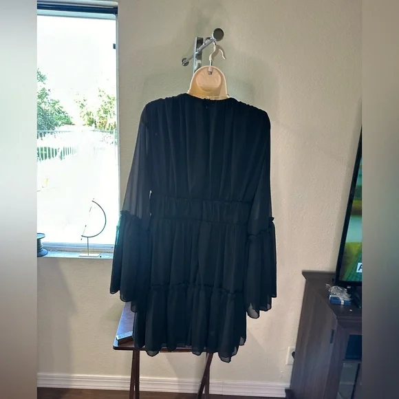 Black Boho dress with a sexy flare. - Picture 2 of 4